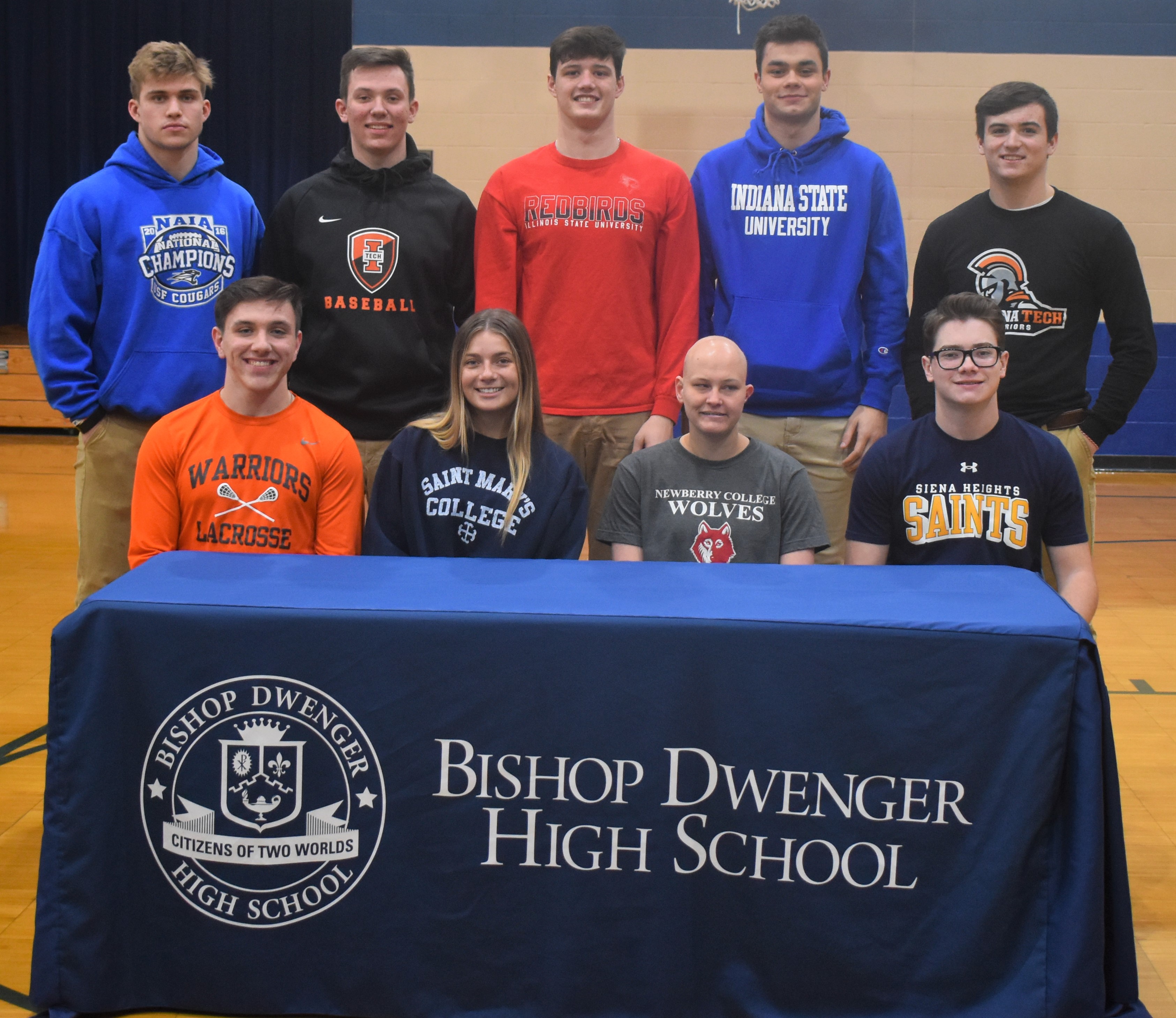 Saints Sign for Athletic Advancement Dwenger High School
